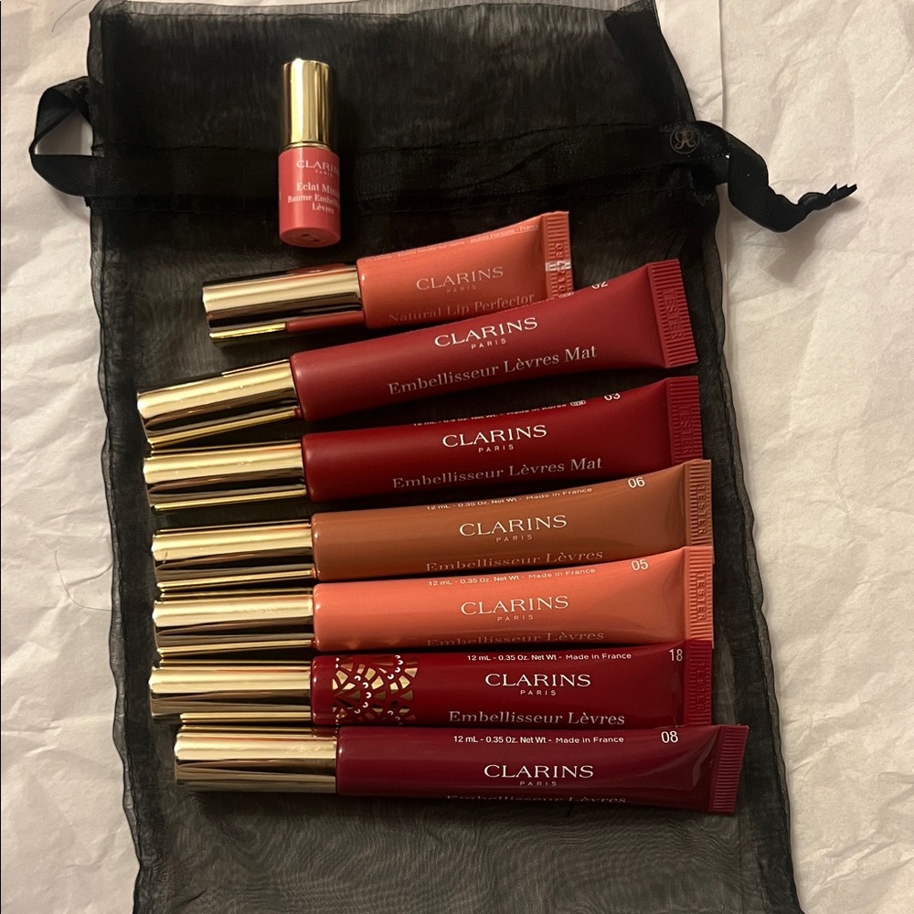 Clarins Lip Enhancers — Assorted Red, Coral, Peach & Pink Shades